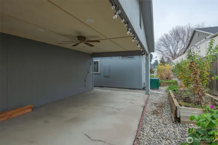 Large covered patio area with privacy.