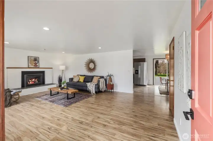 Large living space with a cozy gas fireplace