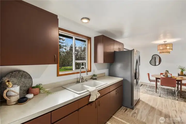 Over the sink window faces the large backyard and garden
