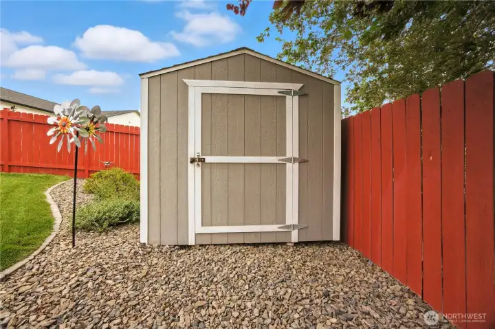 Storage shed included