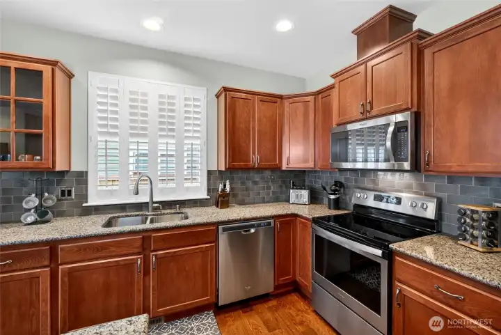 Custom shutters are installed in many of the windows throughout the home