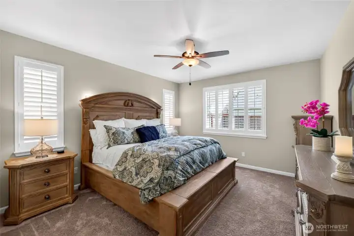 Primary Bedroom is spacious and filled with light