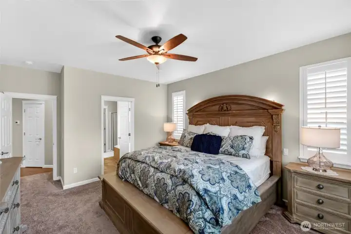 Primary suite is at the opposite end of the house from the other two bedrooms.