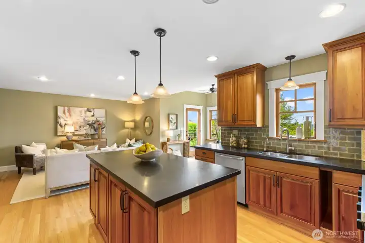 Custom cherry cabinets with honed granite counter tops.