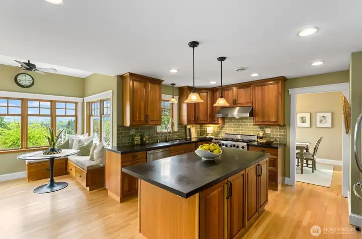 Lovely eat-in kitchen nook that over looks backyard.