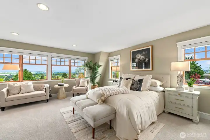 Primary bedroom with views of Cascades, Mt Rainier and some city skylines!