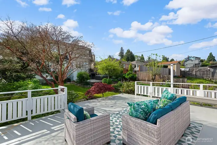Rooftop deck off of detached garage/shop.