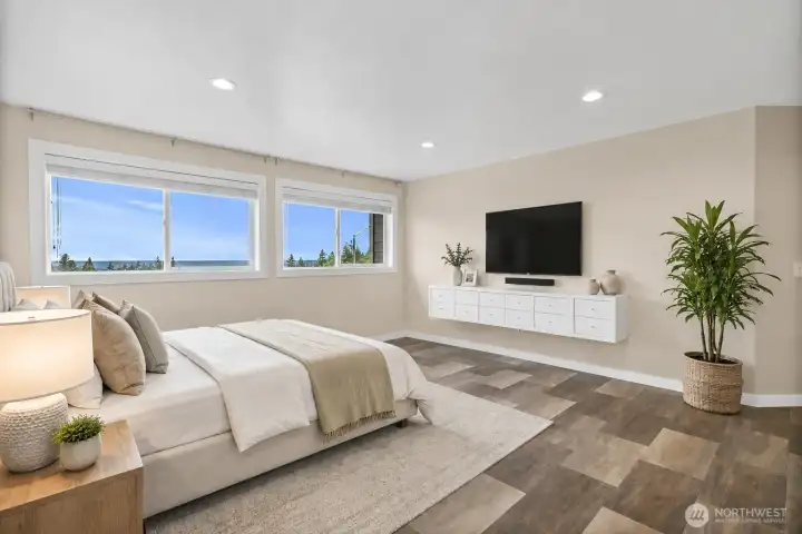 Virtual Stage: Primary bedroom with large windows, view outlook, and built-in wall storage.