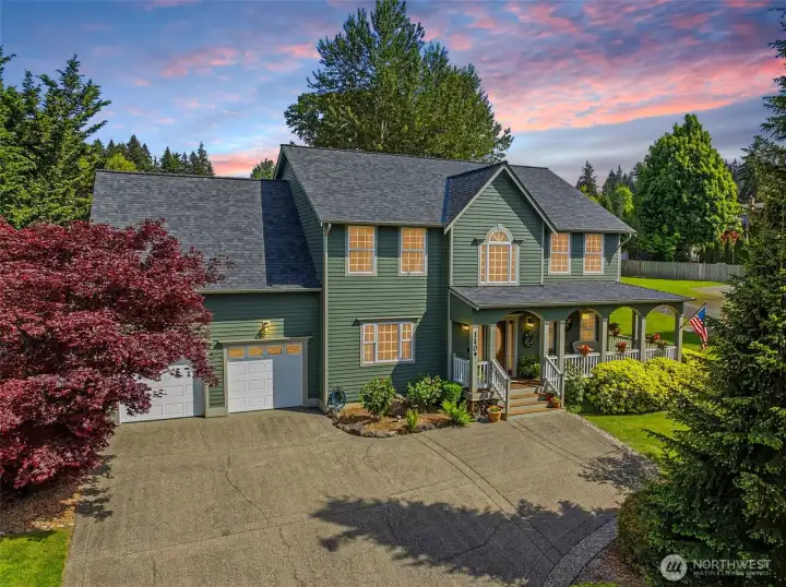 Gorgeous mature landscaping surrounds the home while extensive concrete parking areas offer incredible functionality and flexibility rarely found in this area