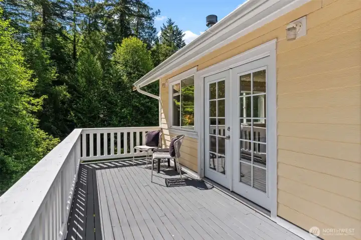 The shared balcony with a little sitting area to enjoy your morning coffee.