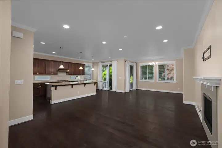 Expansive open-concept great room connects the kitchen, dining and living areas beneath 9-foot ceilings. Expansive open-concept great room connects the kitchen, dining and living areas beneath 9-foot ceilings.