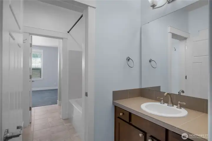 Simplify busy mornings with a thoughtfully arranged bath connecting the secondary bedrooms. Simplify busy mornings with a thoughtfully arranged bath connecting the secondary bedrooms.