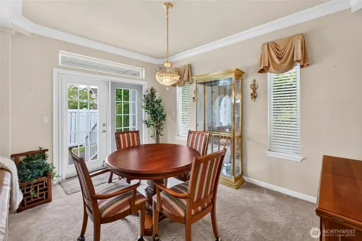 French doors in the dining room open up to the private back yard French doors in the dining room open up to the private back yard