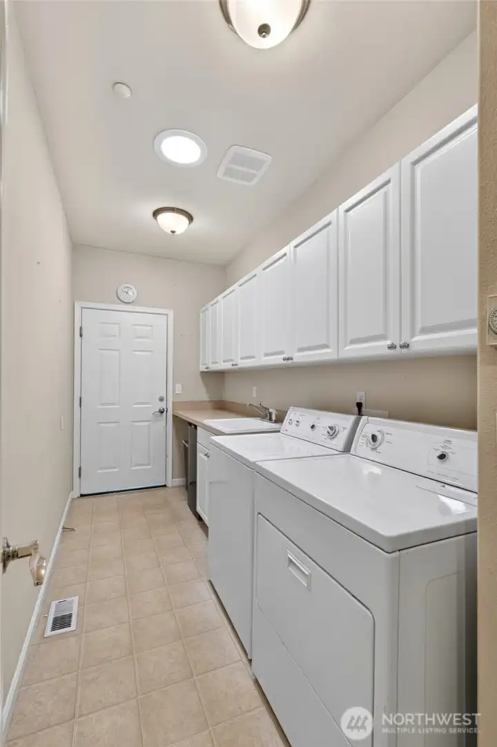 tons of storage in this utility room tons of storage in this utility room