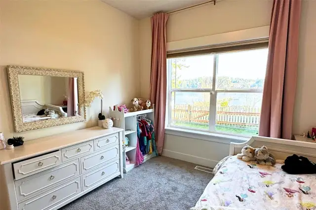 Second bedroom enjoys a water view.