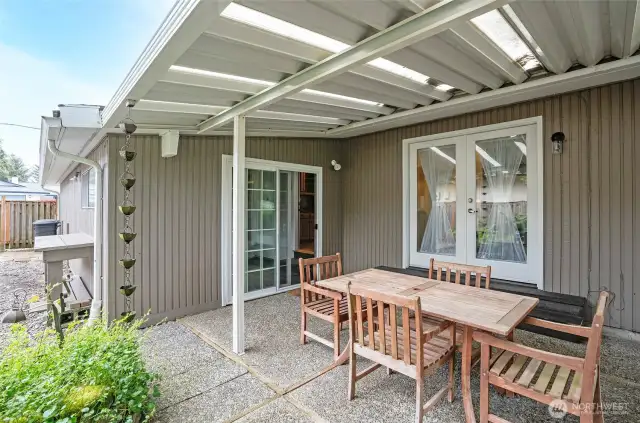 French doors off the dinning room and sliding glass door off the oversized garage.