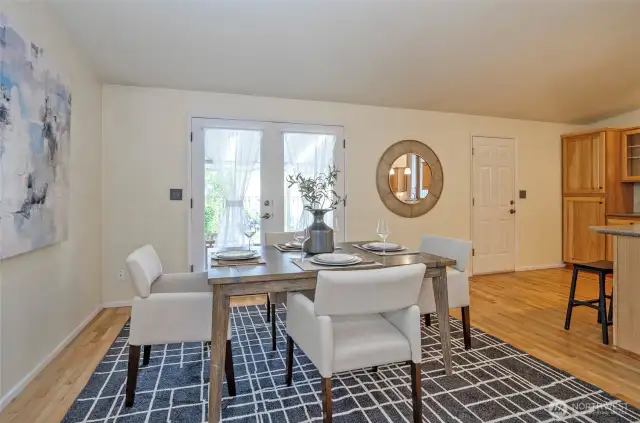Enjoy dinning while the French doors are open over looking the patio.