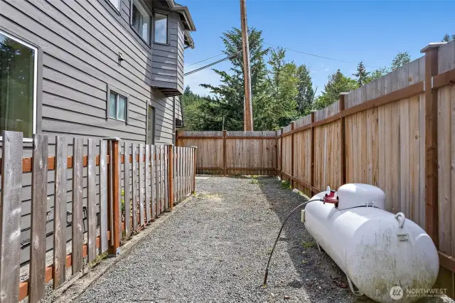 side of entrance and propane tank
