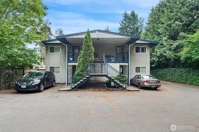 There are 7 parking spots; 1 garage, 3 carport, 3 open stalls.