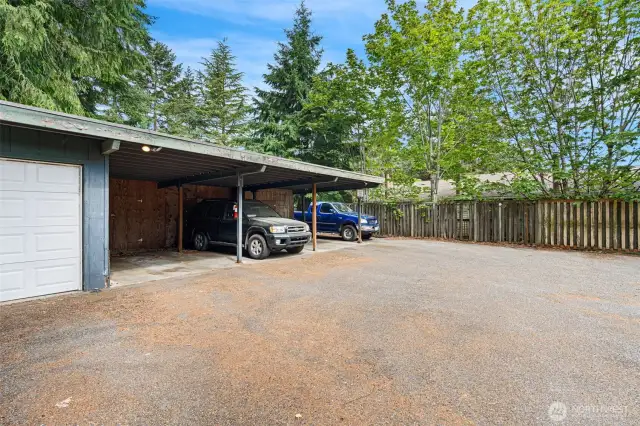 3 storage lockers behind the carport, one unit gets the garage.