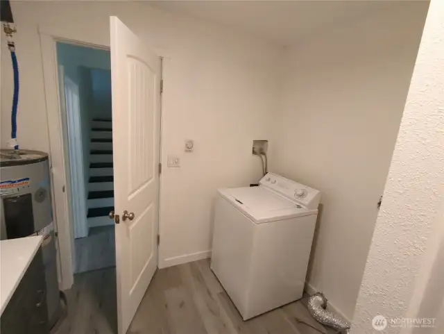 Main floor utilities and shower in the bathroom