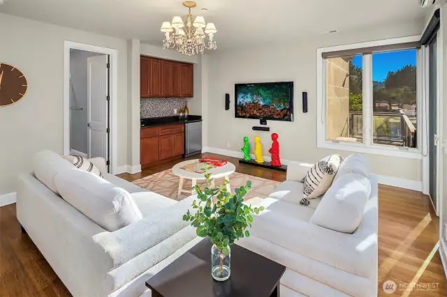 2nd floor large flex space has a wet bar & opens to the roof top deck