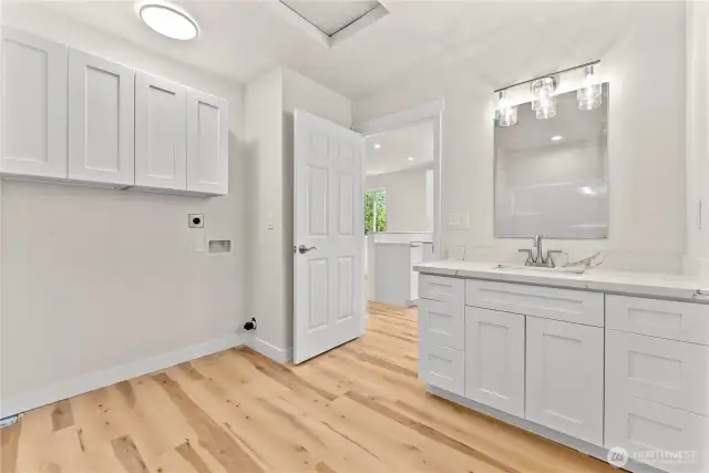 Bathroom with laundry area