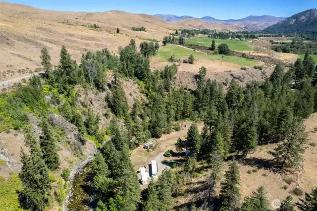 The property is easily accessed off a County-maintained road only 4+ miles from Twisp.