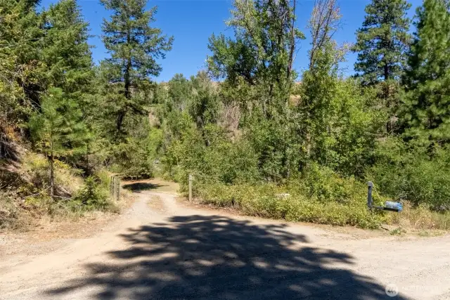 The property is accessed off Poorman Creek Cut-off Road which is County maintained and plowed in the winter.