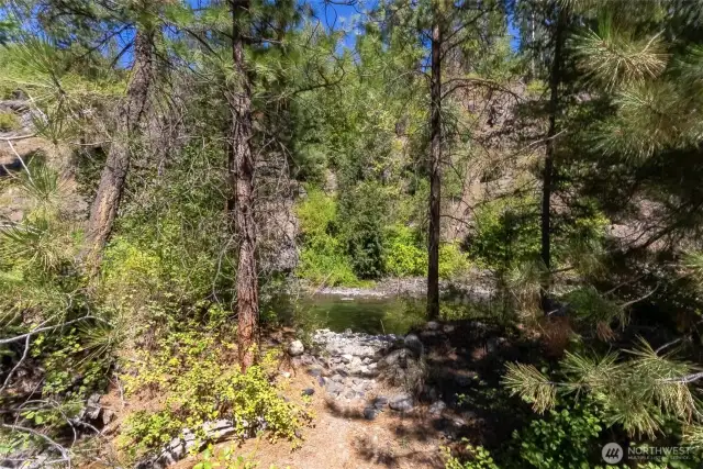 Step down from the grassy lawn to enter a number of small beaches and the perfect swimming hole!