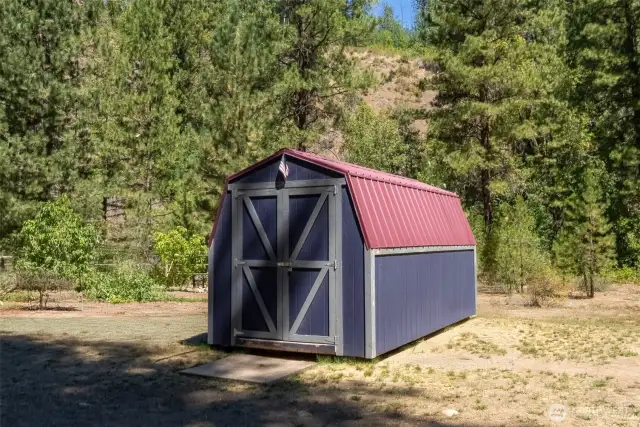 A second shed is perfect for gardening tools and a riding lawnmower.