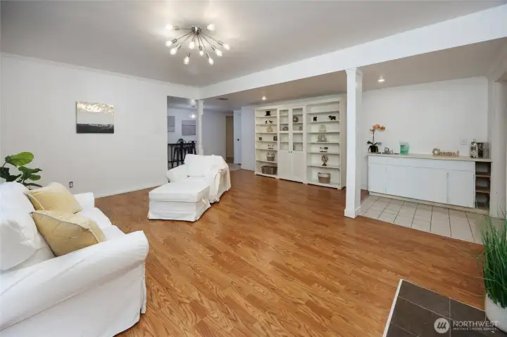 Lower level great room facing the downstairs hallway.
