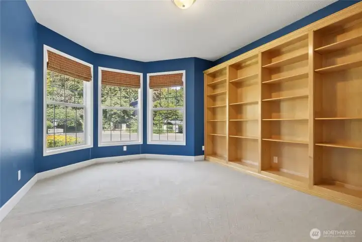 Den, bookcases , closet, french doors