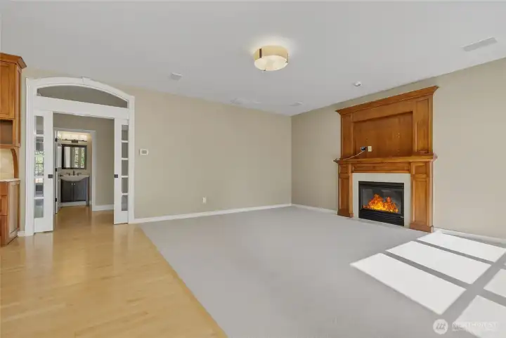 Family room, pocket doors to foyer