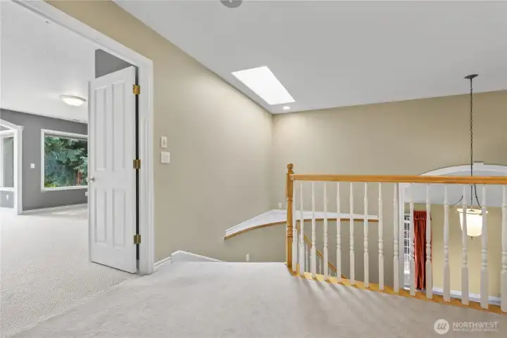 Landing, double doors to primary suite