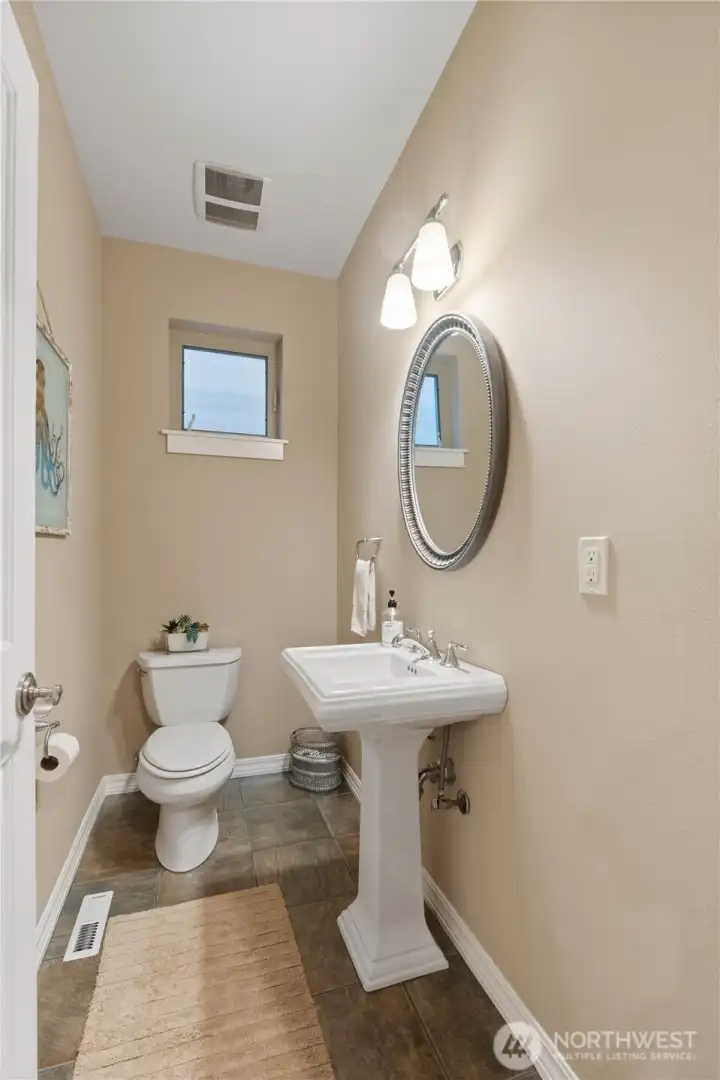 There is a powder room on the main floor for your guests.