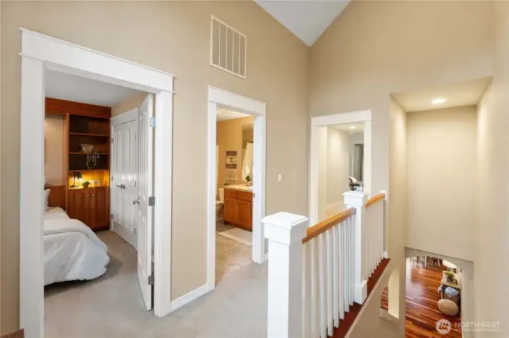 Upstairs you will find an additional guest bedroom, bathroom, and the primary suite.