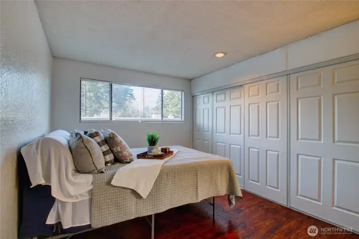 Huge primary suite with a full wall of closet space