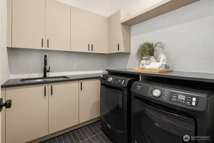 Laundry room conveniently located near bedrooms