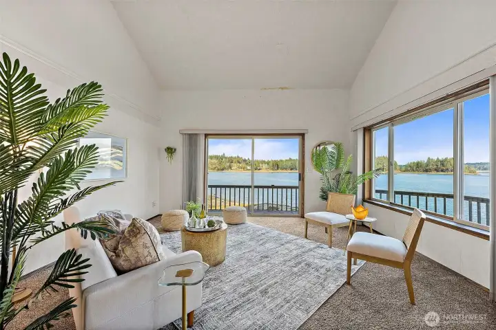 Comfortable living space designed to showcase the views through picture windows.