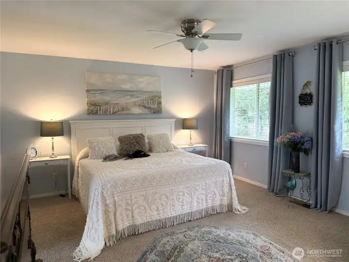 Primary bedroom suite on the south side of the home. Very roomy.