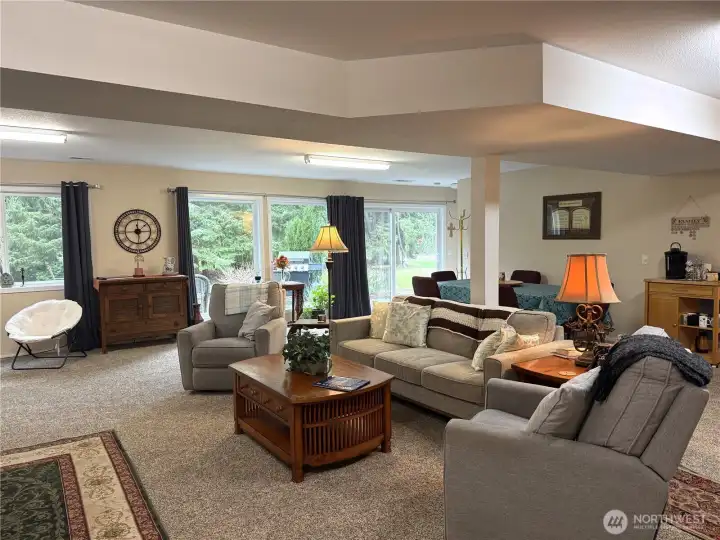 Sliding glass door to patio. Lots of room for many activities, including dining.