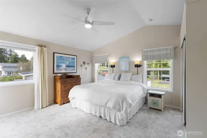 Primary bedroom with views of liberty bay