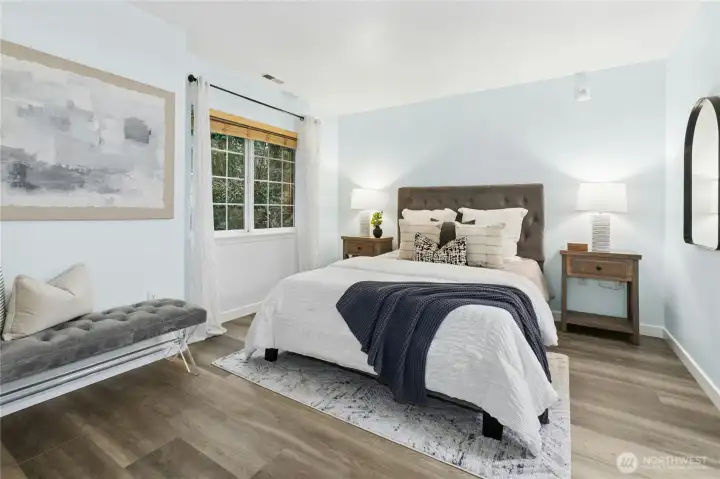 hop across the hall to the second bedroom. Spacious!