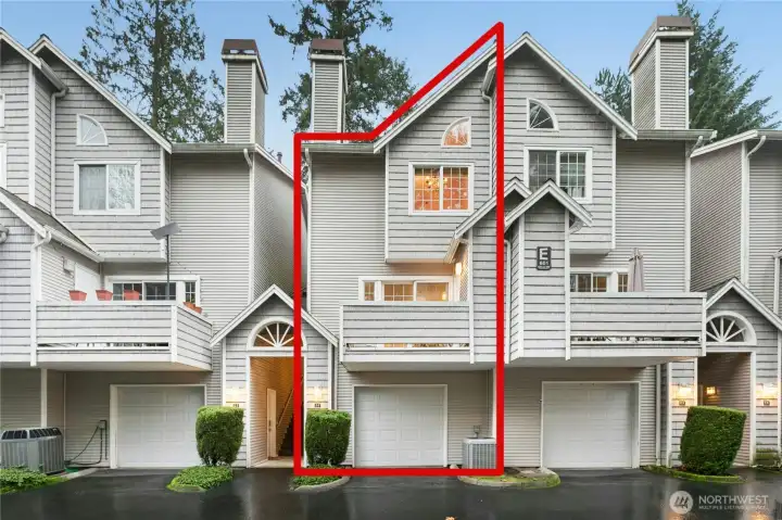 Front view of home, just across the privte drive from your two covered assigned parking spots, and two convenient sared guest spots.