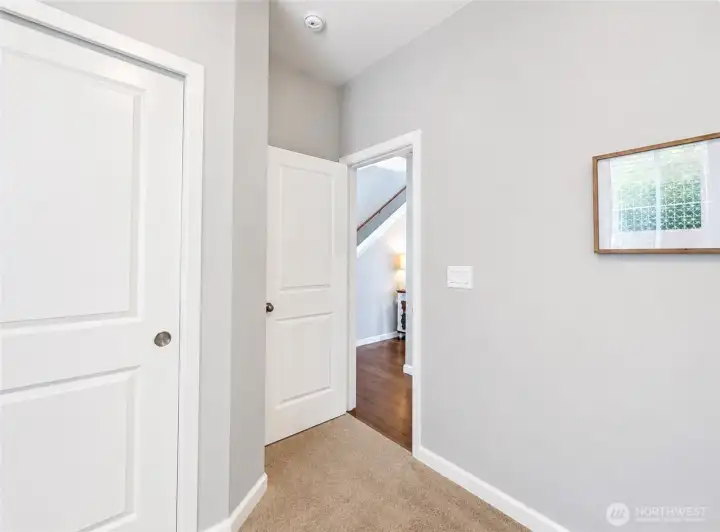 leaving the main floor bedroom, the home transitions, seamlessly into the open concept living space