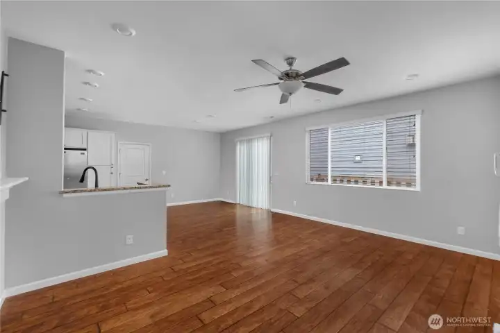 Beautiful floors, abundant lighting, and open living spaces create an inviting atmosphere for both entertaining and quiet evenings at home