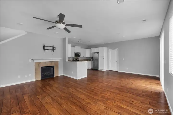 anchored by a cozy fireplace this inviting living space, blends, comfort style, and connection