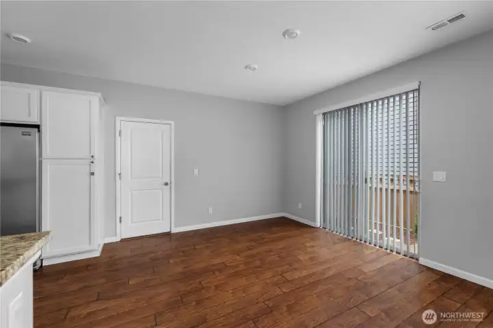 The dining area offers the perfect setting for morning coffee, dinners, and seamless indoor outdoor entertaining