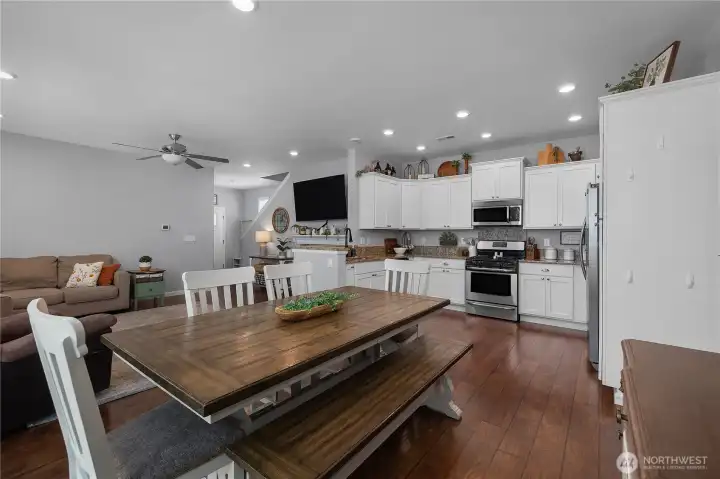 designed with modern living in mind, the kitchen serves as the hub of the home with generous storage, abundant prep space, and sightlines throughout the main living areas.